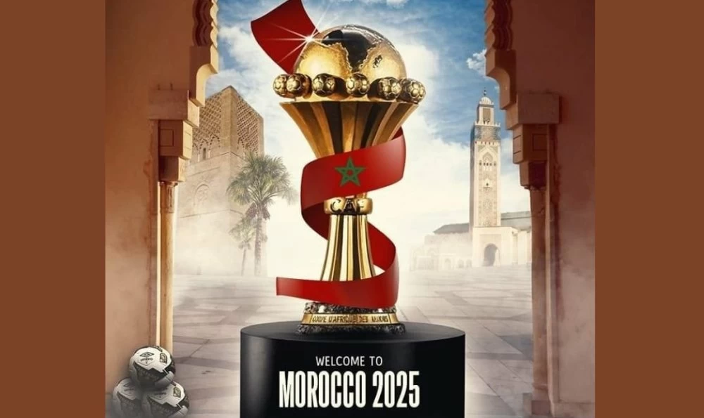 Supporters africains célébrant un but pendant un match de la CAN 2025 – ambiance à vivre en regardant la CAN 2025